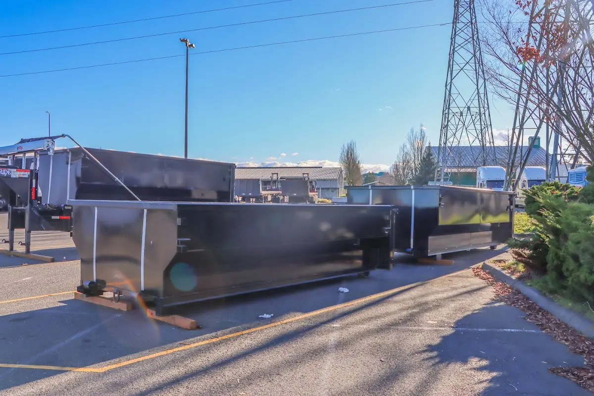 Roll-off dumpster ready for waste disposal at job site for 3 Yard Dumpster Rental in Tucker